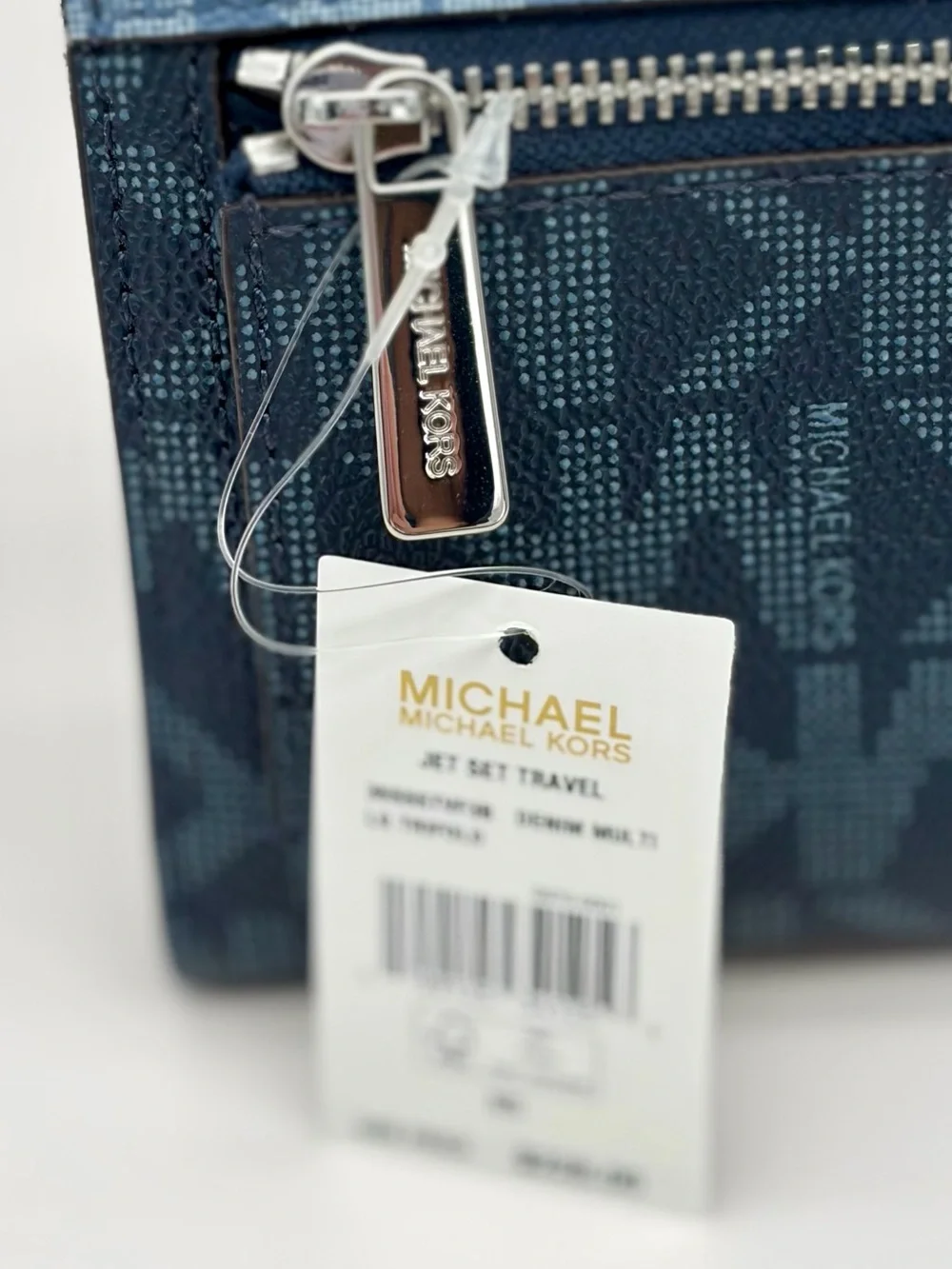 Michael Kors fold compartments over